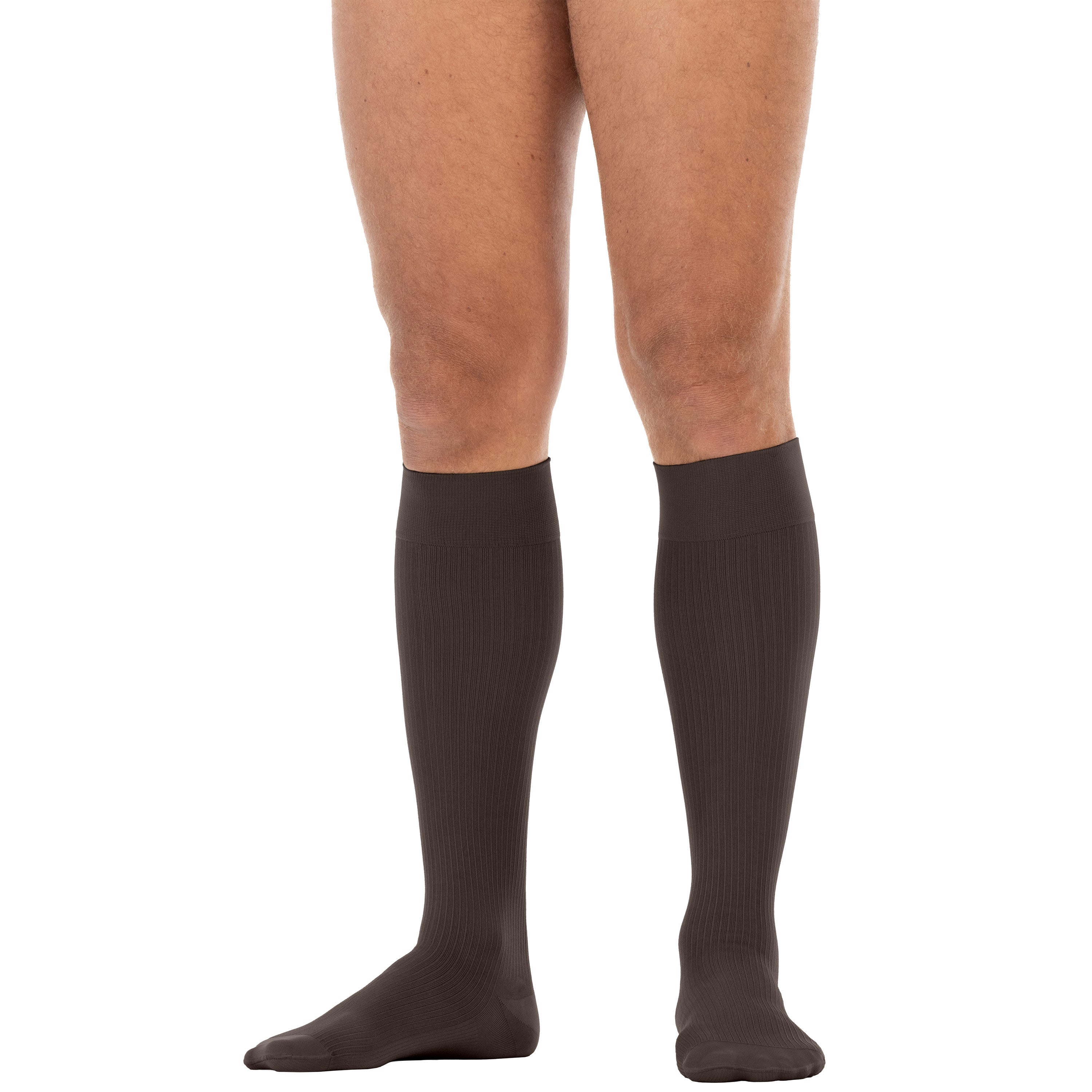 Brown knee-high socks worn by a person on a white background